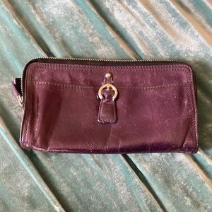 Beautiful gently used Tano Purple Leather Wallet